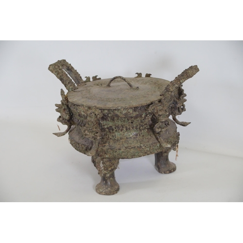 43 - Archaic Bronze Chinese Ding Vessel  This exquisite archaic bronze Chinese ding vessel is a testament... 