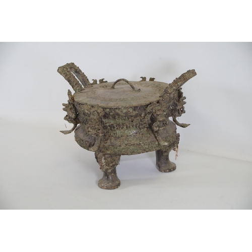 43 - Archaic Bronze Chinese Ding Vessel  This exquisite archaic bronze Chinese ding vessel is a testament... 