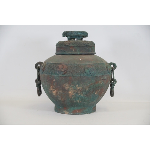 44 - Archaic Bronze Chinese Wall Hanging Wine Pot  This archaic bronze wine pot from China is a remarkabl... 