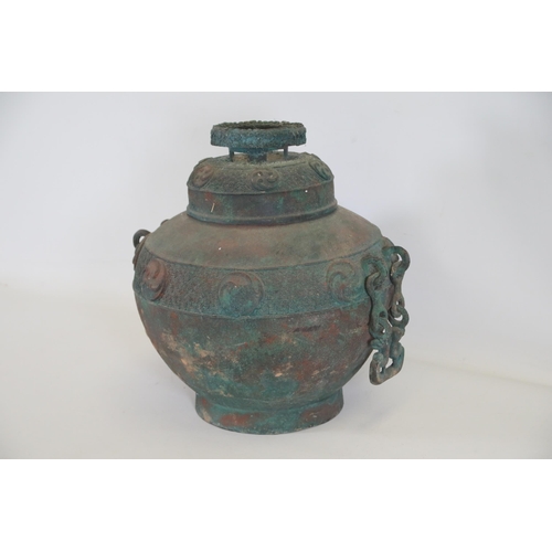 44 - Archaic Bronze Chinese Wall Hanging Wine Pot  This archaic bronze wine pot from China is a remarkabl... 