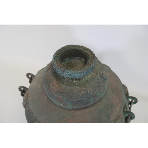 44 - Archaic Bronze Chinese Wall Hanging Wine Pot  This archaic bronze wine pot from China is a remarkabl... 