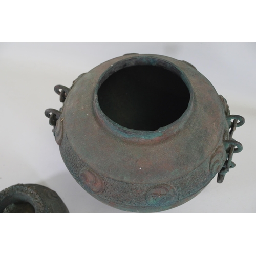 44 - Archaic Bronze Chinese Wall Hanging Wine Pot  This archaic bronze wine pot from China is a remarkabl... 