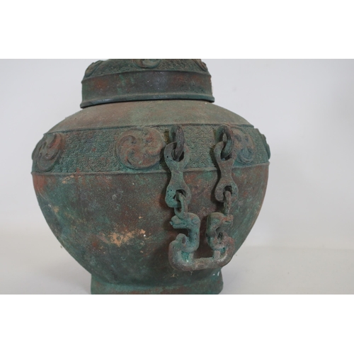 44 - Archaic Bronze Chinese Wall Hanging Wine Pot  This archaic bronze wine pot from China is a remarkabl... 