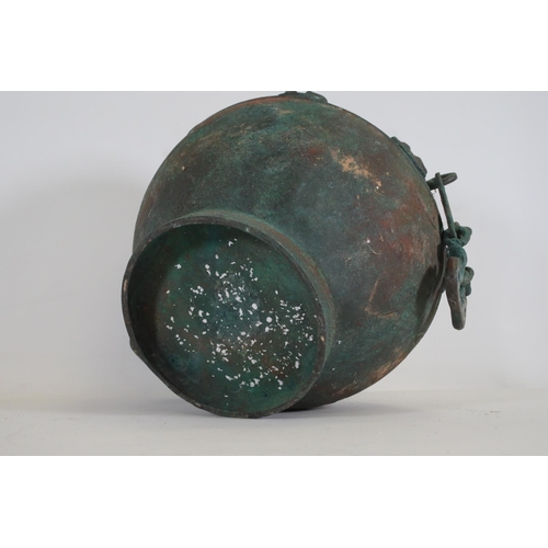 44 - Archaic Bronze Chinese Wall Hanging Wine Pot  This archaic bronze wine pot from China is a remarkabl... 