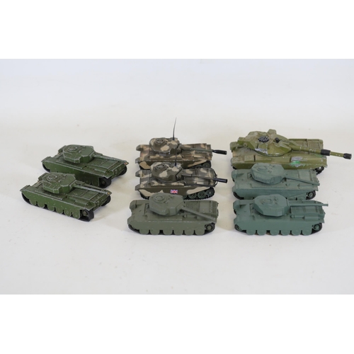 51 - Collection of 8 Diecast Toy Tanks by Dinky Toys and Corgi  This impressive collection features eight... 