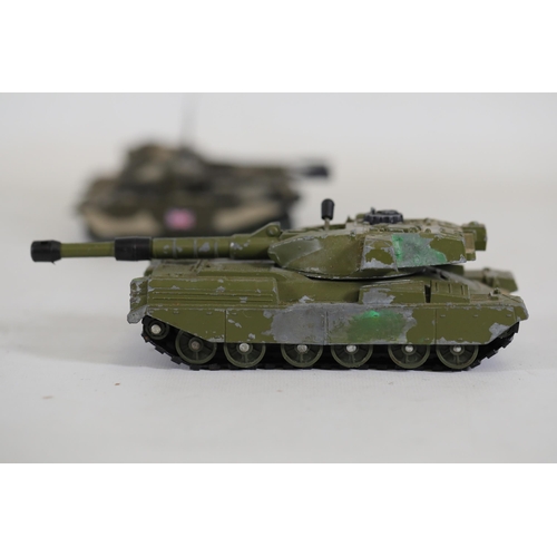 51 - Collection of 8 Diecast Toy Tanks by Dinky Toys and Corgi  This impressive collection features eight... 