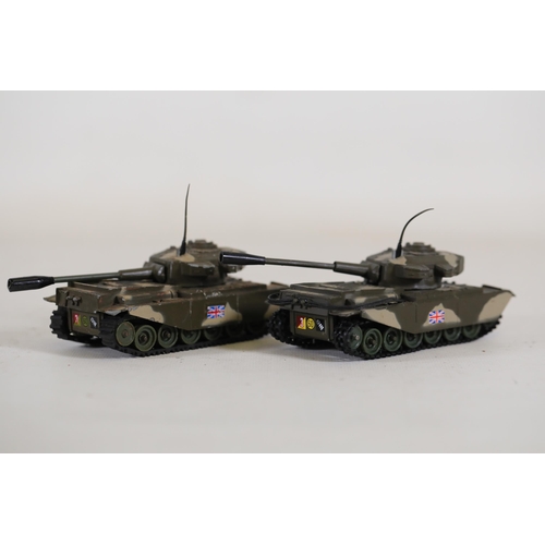 51 - Collection of 8 Diecast Toy Tanks by Dinky Toys and Corgi  This impressive collection features eight... 