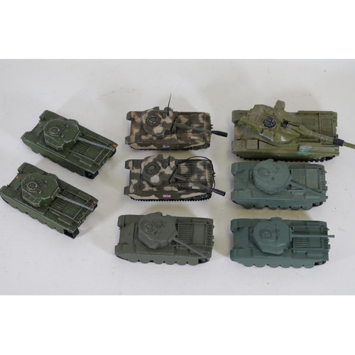 51 - Collection of 8 Diecast Toy Tanks by Dinky Toys and Corgi  This impressive collection features eight... 