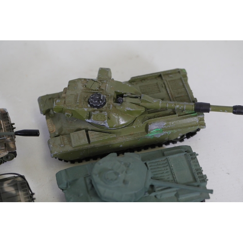 51 - Collection of 8 Diecast Toy Tanks by Dinky Toys and Corgi  This impressive collection features eight... 