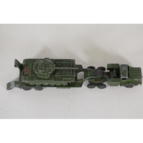 55 - **Collection of Seven Miniature Military Vehicles by Corgi and Dinky Toys**  This collection feature... 