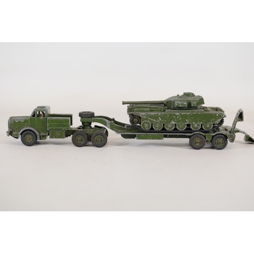 55 - **Collection of Seven Miniature Military Vehicles by Corgi and Dinky Toys**  This collection feature... 