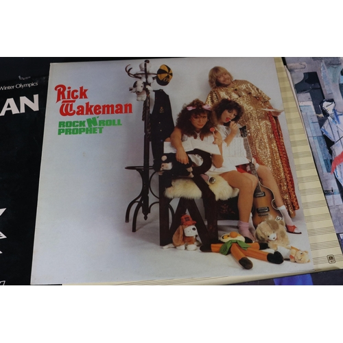 56 - Collection of 9 Rick Wakeman Vinyl Records: CDS4022, AMLH 64361, AMLX 68508, AMLK 64660, AMLK 64583,... 