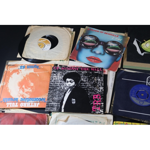 60 - Collection of Vinyl Singles, approximately 35 in total,mostly with covers, some loose, varying condi... 