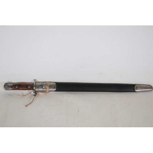 855 - 1907 Lee-Enfield Bayonet with Leather Scabbard  This 1907 Lee-Enfield bayonet, measuring 22.5 inches... 