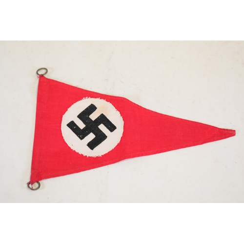 858 - Third Reich NSDAP Pennant with Swastika Symbol and Brass Mounting Rings  This item is a red Third Re... 