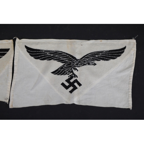 859 - **Nazi Germany Embroidered Uniform Insignias Featuring Eagles and Swastikas**  This collection inclu... 