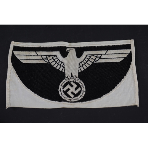 859 - **Nazi Germany Embroidered Uniform Insignias Featuring Eagles and Swastikas**  This collection inclu... 