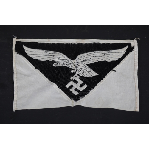 859 - **Nazi Germany Embroidered Uniform Insignias Featuring Eagles and Swastikas**  This collection inclu... 