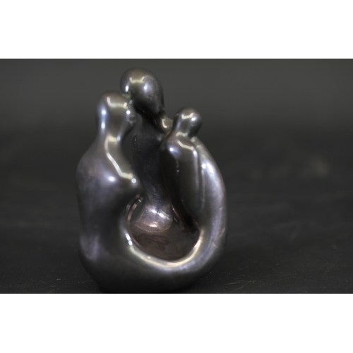 81 - 925 Silver Sculpture by D. Jaron Depicting Two Embracing Figures

This finely crafted sculpture, wei... 