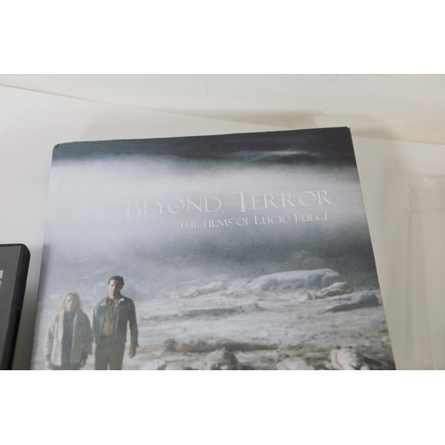 Lucio Fulci signed collection with Zombie media and