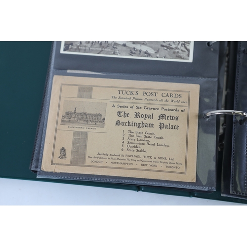 Green postcard album with collection of vintage postcardsA green vinyl ...