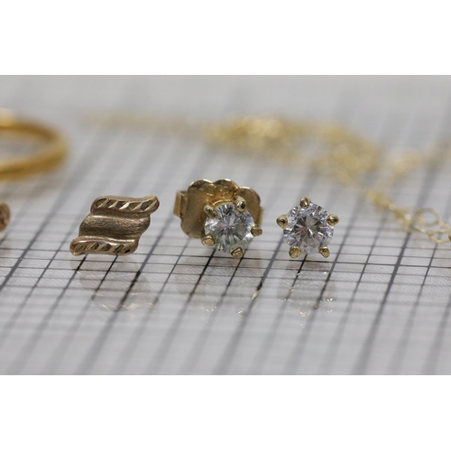 1212 - Assorted gold jewellery with SPECIAL MUM pendant, dolphin and cameo earrings, 7.74 gramsA compact co... 