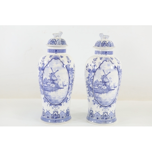 1375 - Pair of Delft Blue and White Lidded Vases with Windmill ScenesMatched pair of Delftware ceramic vase... 