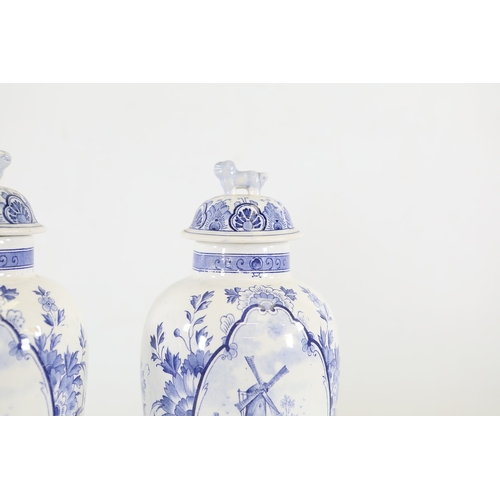 1375 - Pair of Delft Blue and White Lidded Vases with Windmill ScenesMatched pair of Delftware ceramic vase... 