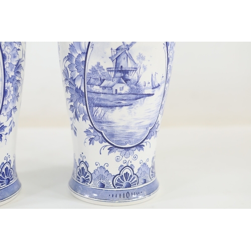1375 - Pair of Delft Blue and White Lidded Vases with Windmill ScenesMatched pair of Delftware ceramic vase... 