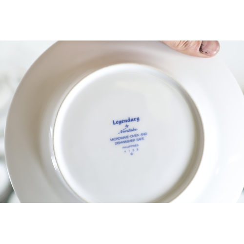 1426 - Noritake green bordered porcelain dinner service for six, 60 plus piecesFine Noritake porcelain dinn... 