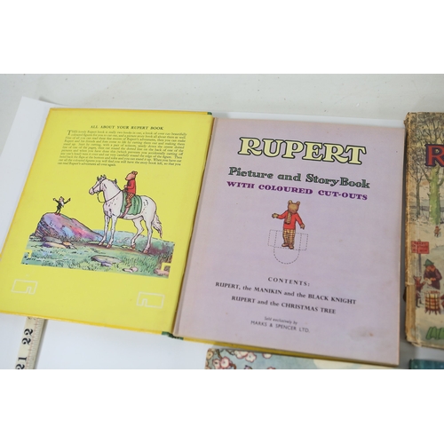 Collection of twelve Rupert annuals and booksA collection of twelve ...