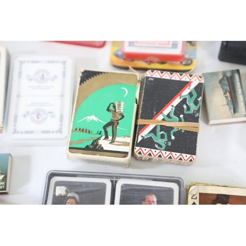 Collection of playing cards and novelty card packsA mixed collection of ...
