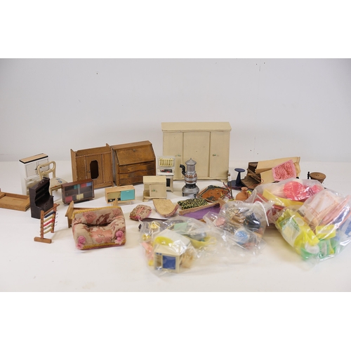 564 - Mid to late 20th century dollhouse furniture and accessoriesA mixed collection of about 30 vintage d... 