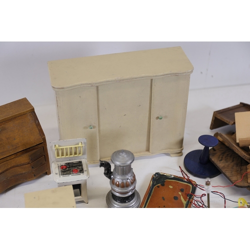 564 - Mid to late 20th century dollhouse furniture and accessoriesA mixed collection of about 30 vintage d... 