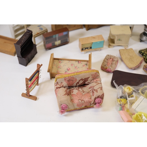 564 - Mid to late 20th century dollhouse furniture and accessoriesA mixed collection of about 30 vintage d... 