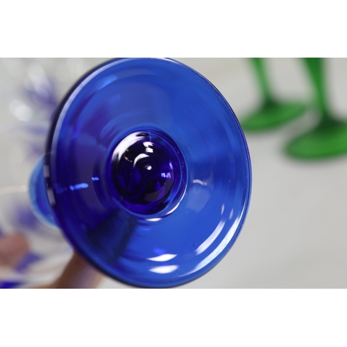 971 - Cobalt, Green and Frosted Glass Stemware with Blown Jug, 10 PiecesA cohesive collection of hand-craf... 