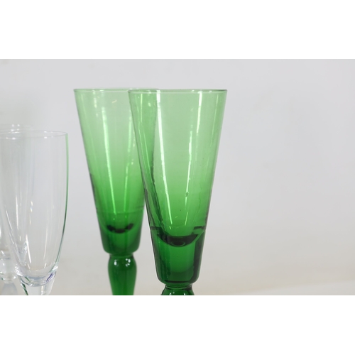 971 - Cobalt, Green and Frosted Glass Stemware with Blown Jug, 10 PiecesA cohesive collection of hand-craf... 