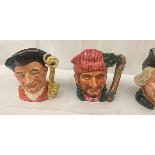 69 - Four Royal Doulton Character Jugs Small to include The Gardener, Robin Hood, Gaoler, The Lumberjack ... 