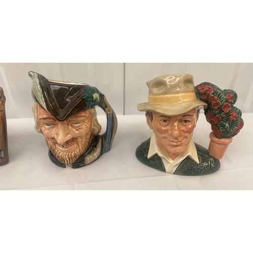 69 - Four Royal Doulton Character Jugs Small to include The Gardener, Robin Hood, Gaoler, The Lumberjack ... 