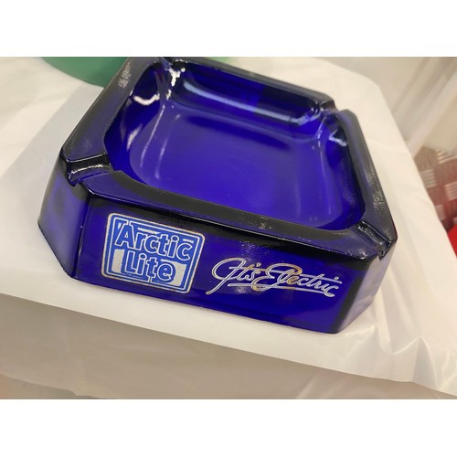 111 - Four Vintage Ash Trays to include Theakston, Heineken, Mansfield, Artic Lite (4)