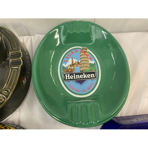 111 - Four Vintage Ash Trays to include Theakston, Heineken, Mansfield, Artic Lite (4)