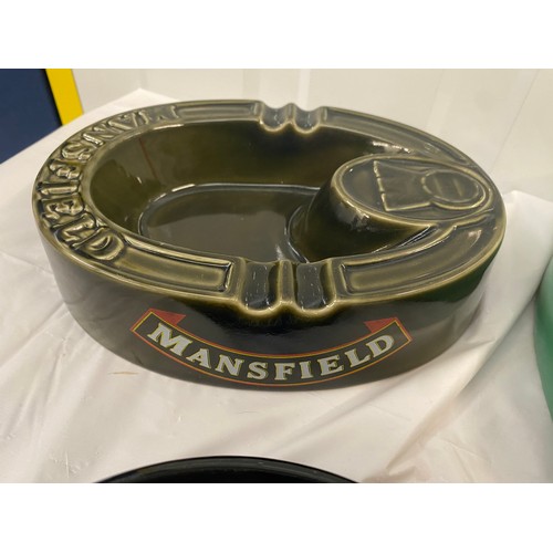 111 - Four Vintage Ash Trays to include Theakston, Heineken, Mansfield, Artic Lite (4)