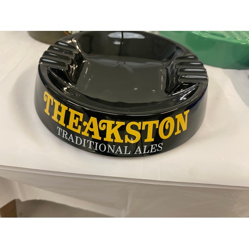 111 - Four Vintage Ash Trays to include Theakston, Heineken, Mansfield, Artic Lite (4)