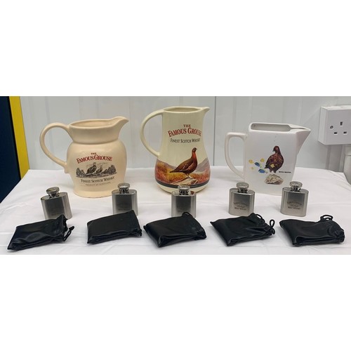 115 - Three Vintage Famous Grouse Jugs and Five Famous Grouse Hip Flasks In Bags (8)