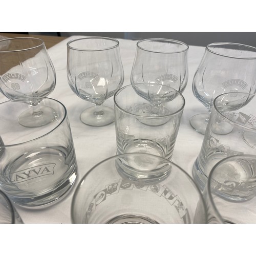 496 - Large selection of Whiskey Branded Glasses, all unused. To include, Baileys, Rugby World Cup, Glayva... 