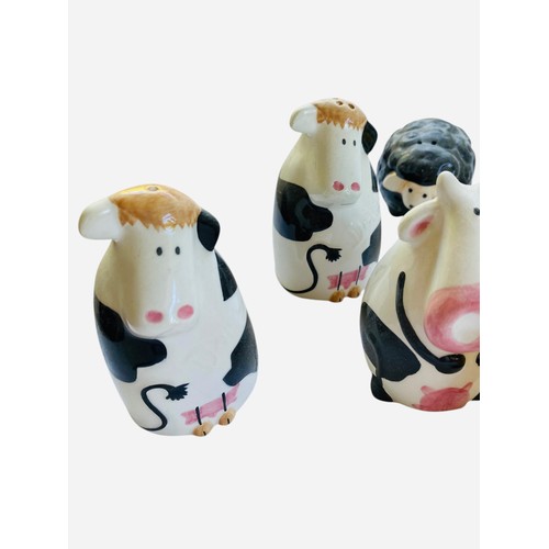 86 - Job lot of cows, colourful dogs