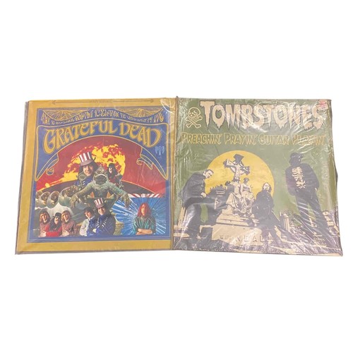 43 - Pair of 12-inch rock LPs including the Grateful Dead's self-titled album on Warner Bros. and Tombsto... 