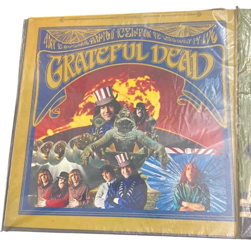 43 - Pair of 12-inch rock LPs including the Grateful Dead's self-titled album on Warner Bros. and Tombsto... 