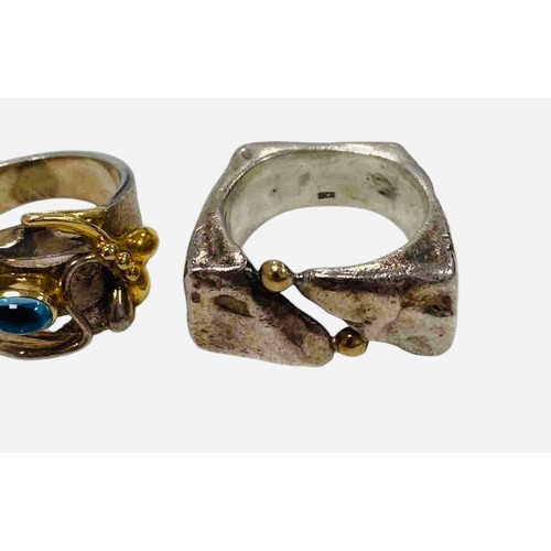 2 - Two statement piece Silver Rings, one with gold trim and blue gemstone