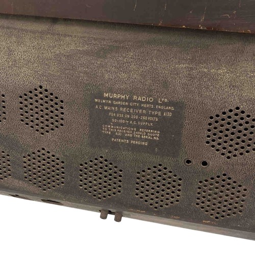 55 - A Mid-Century Murphy valve radio receiver, model A130, in a curved case with green station dial, tex... 